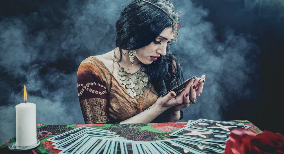 woman reading cards